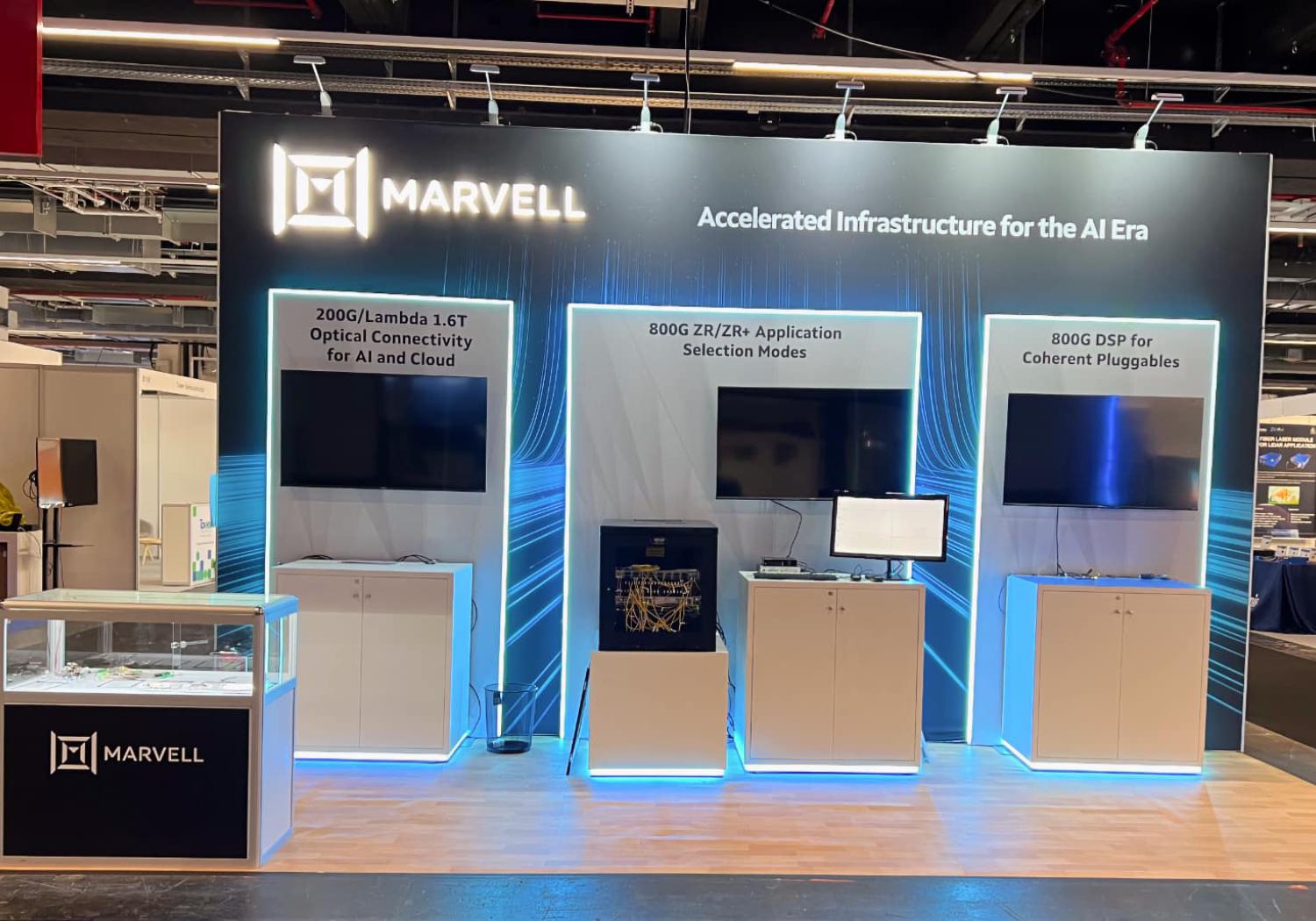 Marvell stand with back wall, LED edge lighting and a display counter